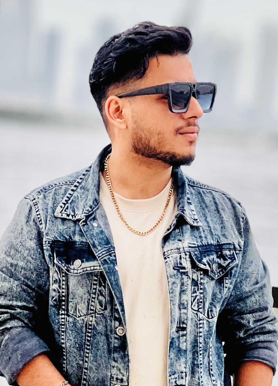 Shaffay Bajwa in Dubai, with the city skyline behind him